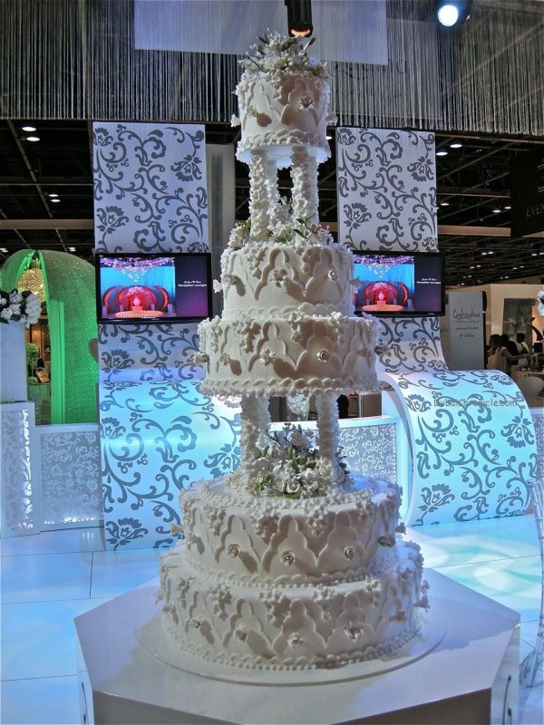The common characteristics of all wedding cakes are multistory structure