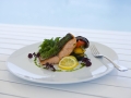 Dill marinated Scottish Salmon served with rocket and salsa verde