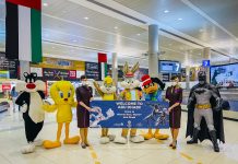 Warner Bros. World™ Abu Dhabi Greets Visitors at The International Airport Visitors To The Capital Get A Warm Welcome From Warner Bros. World™ Abu Dhabi And Etihad Airways At Abu Dhabi International Airport
